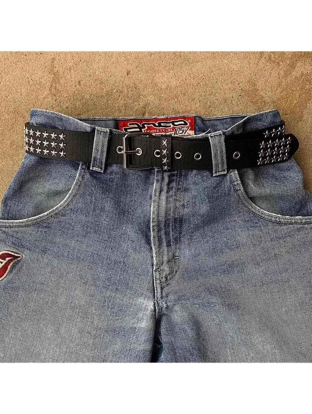 Cyber Y2k 2000s style star studded grunge emo black and silver belt. High